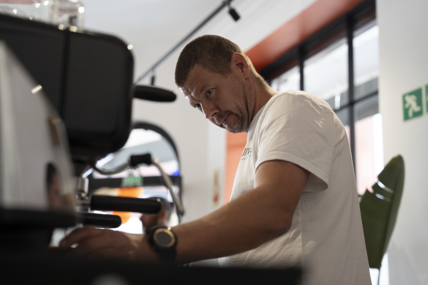 Quincy, part of the Quiver Café team — click to watch his story