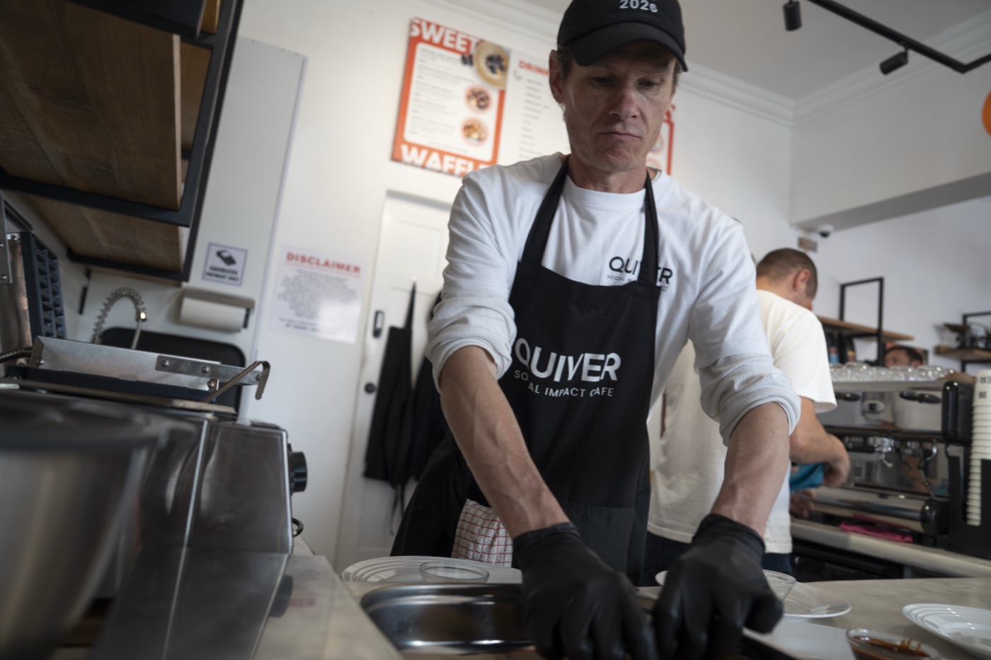Werner, part of the Quiver Café team — click to watch his story
